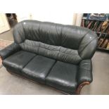 A green leather 3 piece suite