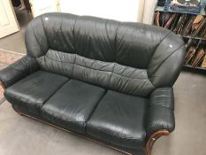 A green leather 3 piece suite