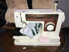 A Singer sewing machine with case