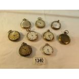 A tray of yellow metal pocket watches (9 in total).