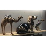 A pottery basset hound dog figure,