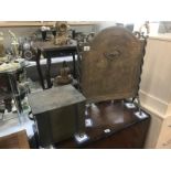 An Edwardian brass fire screen and coal box