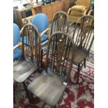 A set of 4 James Lupton & Sons dining chairs