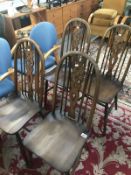 A set of 4 James Lupton & Sons dining chairs