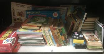 A quantity of children's games & jigsaws