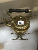 A Victorian brass spirit kettle on stand