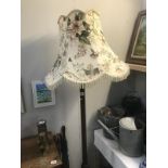 A 1930's standard lamp and shade