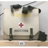 A vintage satchel first aid kit,
