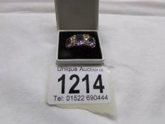 A 9ct gold ring set amethysts, size M.