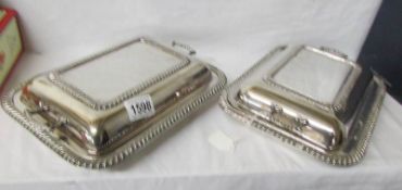 A pair of silver plate vegetable tureens.