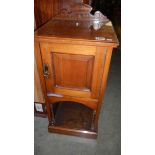 A mahogany pot cupboard.