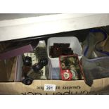 A box of meccano, clock mechanisms, card & brass fitments (taps etc.
