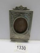 A 19th century French silver photo frame (missing back stand).