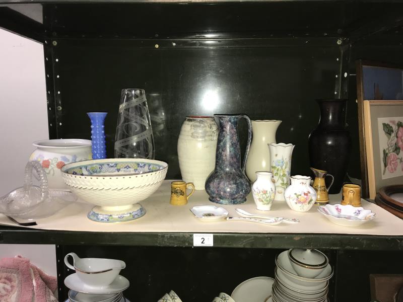 A quantity of porcelain vases, bowls, trays etc.
