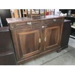 A large sideboard with 2 drawers and 2 doors
