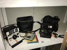 2 polaroid cameras & some French 8mm cine-films
