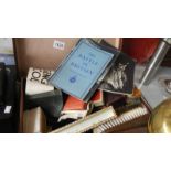 A suitcase of ephemera including an ARP arm band, clothes brushes, playing cards,