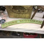 A cast iron Flying Scotsman sign