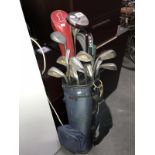 A set of golf clubs & bag