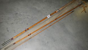 An Edgar Sealey 'Ocotfloat' 11' cane course fishing rod.