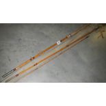 An Edgar Sealey 'Ocotfloat' 11' cane course fishing rod.