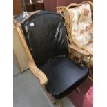 An American style rocking chair with faux leather seating pads