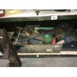 A box of old tools and a metal tool box with more tools