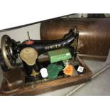 A cased Singer sewing machine