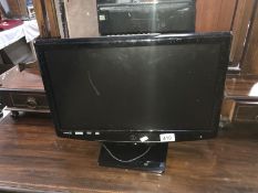 A Samsung 22" flat screen TV with box (no remote)