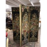 A four-fold room screen with floral tapestry work