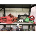 A quantity of electric gardening hand tools including hedge cutters, saw etc.
