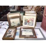 A collection of framed and glazed pictures