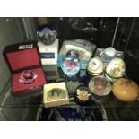A collection of paperweights, trinket boxes etc.