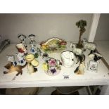 A quantity of china animals etc.