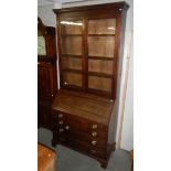 An inlaid bureau bookcase.