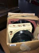 A box of old 45rpm & 78rpm records