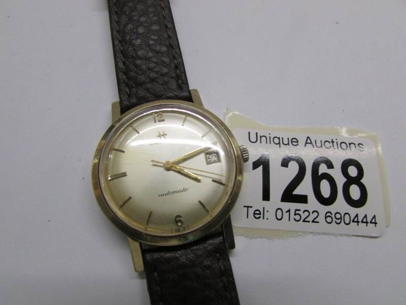 A gent's Hamilton Automatic gold wrist watch.