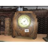 An oak art deco style clock.