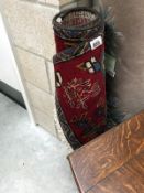 A red and patterened middle eastern rug