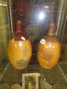 2 Doulton Lambeth jugs with seals featuring Burns Monument and Balmoral Castle.