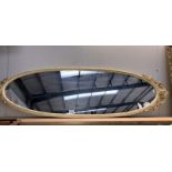A large oval mirror