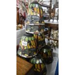 8 matching Tiffany style lamp shades.