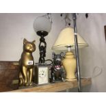 A table lamp, a figural lady lamp,