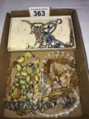 A tray of vintage necklaces etc