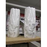 A pair of white Meissen modernist vases, one perfect, one marked with 3 slashes.