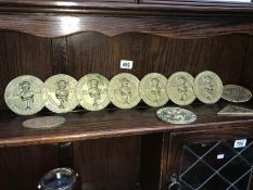 A quantity of brass Lincolnshire steam rally Lincoln Imp plaques