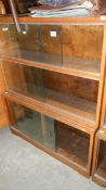 A Globe Wernicke style 3 tier bookcase with glass sliding doors made by Minty Ltd.