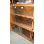 A Globe Wernicke style 3 tier bookcase with glass sliding doors made by Minty Ltd.