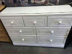 A white bedroom chest of drawers