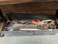 An early 20th Century wooden tool box with a large quantity of tools